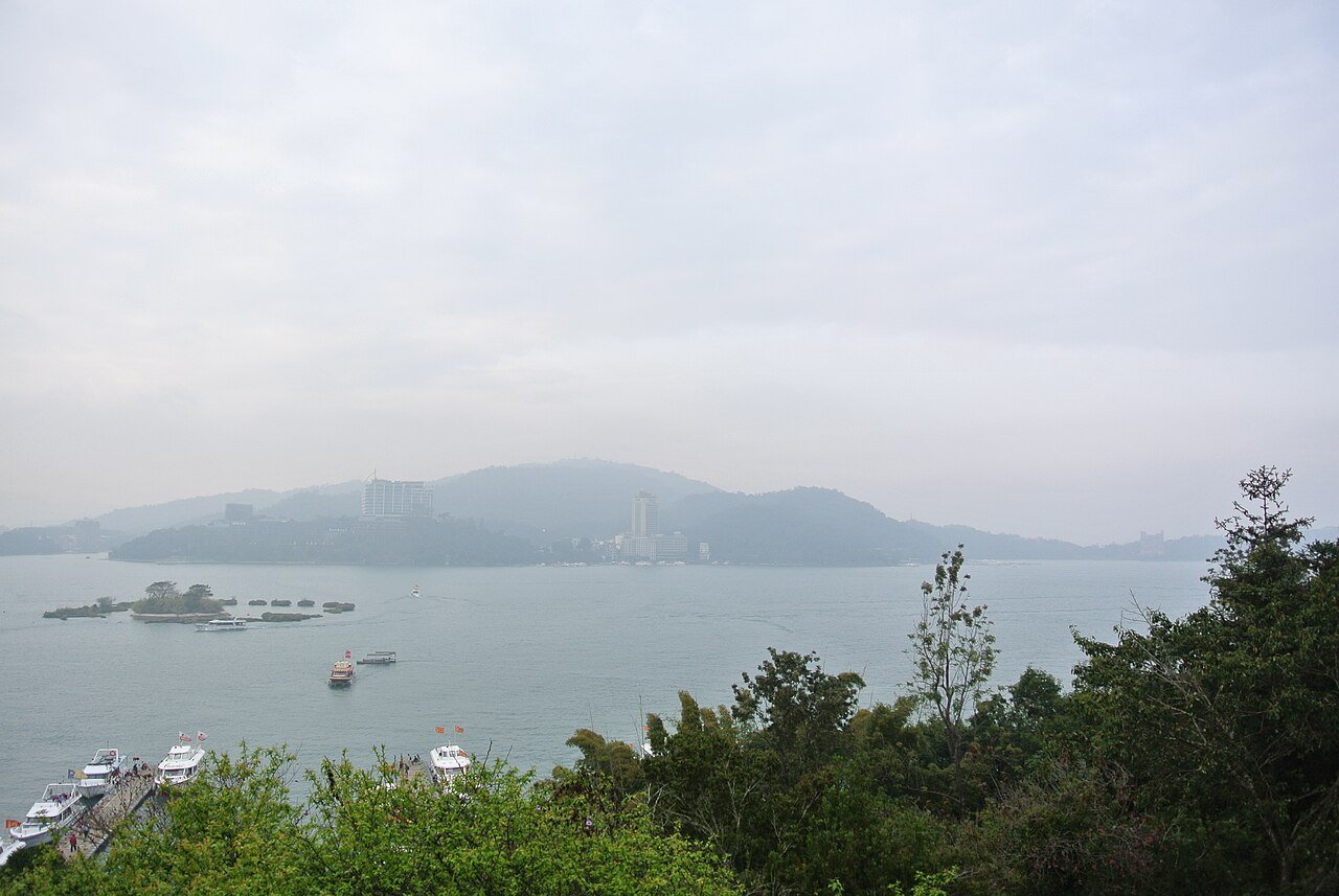 Sun Moon Lake surrounded by green mountains